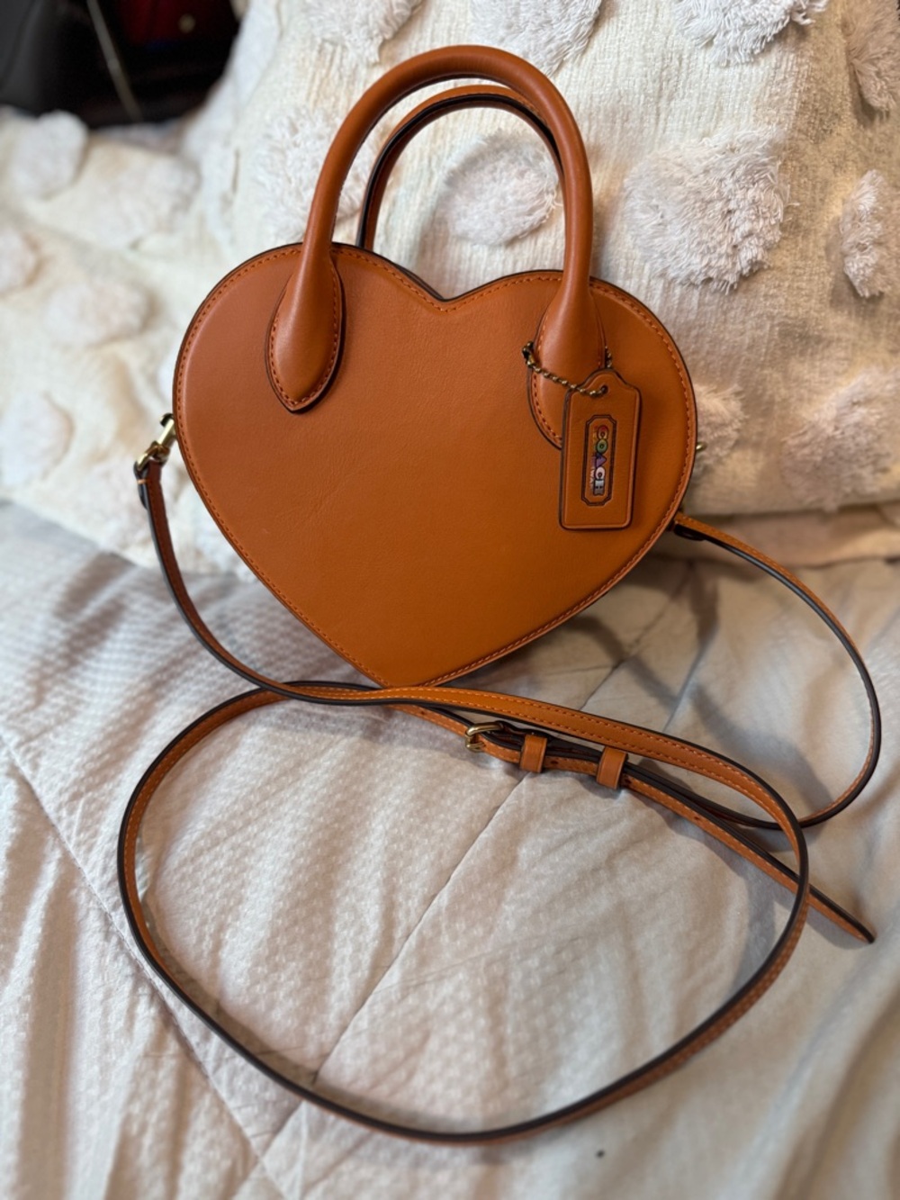 Coach Heart-Shaped Crossbody Bag in Saddle orange with Pride hangtag and strap